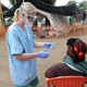 A nurse with the Doctors Without Borders medical-aid organization examines a patient in the intake area at a center for victims of the Ebola virus in Guekedou, Guinea, on April 1, 2014.
SEYLLOU/AFP/Getty Images